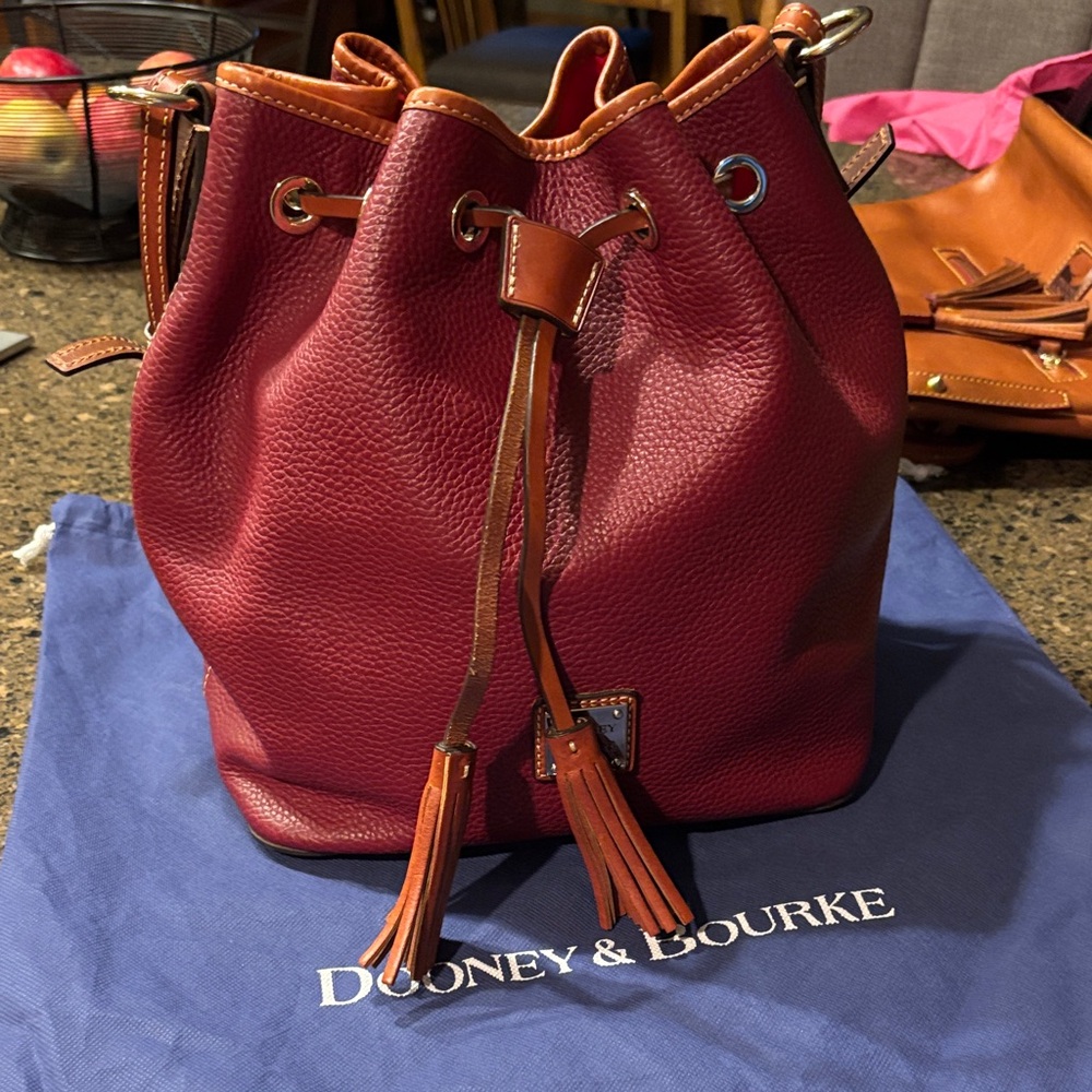Dooney & Bourke Red pebble leather bucket bag/shoulder bag